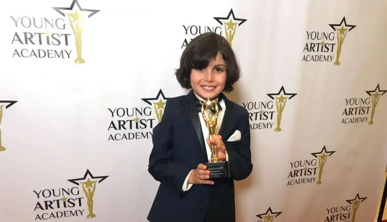 Jonah with the award
